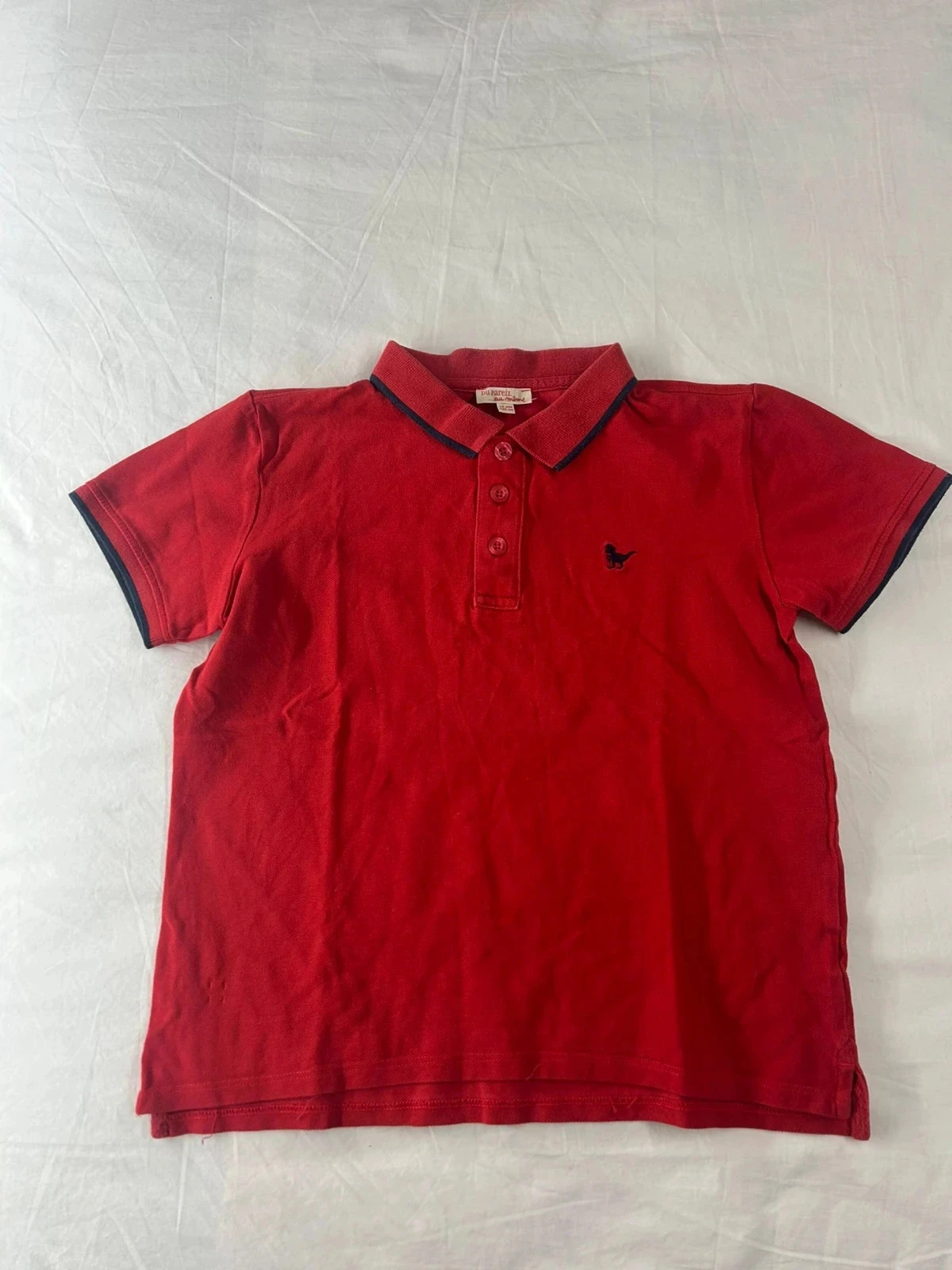Polo rouge du pareil au même